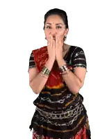 a woman blowing a kiss while wearing a black and red top