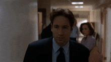 Go Fetch Her Some Water The Xfiles GIF - Go Fetch Her Some Water The Xfiles Mulder GIFs