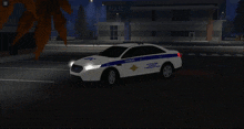 a police car is parked in front of a building that says polici