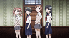 four anime girls are standing next to each other