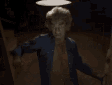 a man is carrying a large wooden barrel in a bar