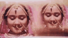 a close up of a bride with her eyes closed and a nose ring on her nose .