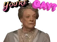 a woman wearing a tiara with the words " you 're gay " behind her