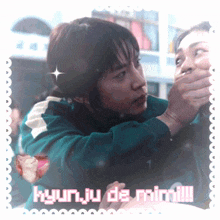 a picture of a man covering another man 's mouth with hyun ju de mimi