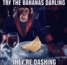a monkey is sitting at a table with a bunch of bananas on it .