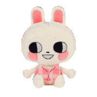 a stuffed animal of a white rabbit with pink ears is sitting on a white background
