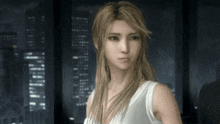 a woman in a white tank top stands in front of a window with a city in the background