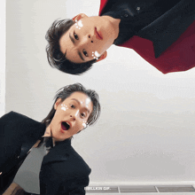 a gif of two men with their faces upside down says bbillkin gif on the bottom