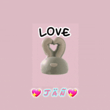 a picture of a bunny with the word love written above it
