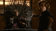 a man stands in front of a throne with the words see the difference behind him