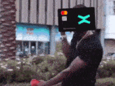 a man holds a mastercard card over his face