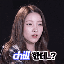 a woman with long hair says chill ? in a foreign language
