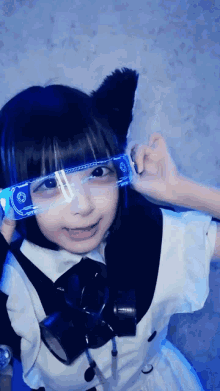 a girl with a cat ear is wearing a pair of glasses that say not a question