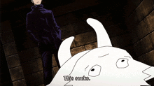 a cartoon character says " this sucks " in front of a brick wall