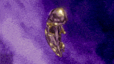 a gold object is floating in the air in a purple space .