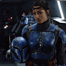 a woman in blue armor holds a blue helmet in her right hand