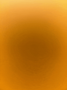 a close up of a yellow background with a blurred texture .