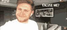 a man is taking a selfie with the words excuse me on the bottom