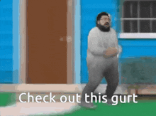a man walking in front of a blue house with check out this gurt written on the bottom
