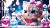 a kitten with a pink bow on its head is sitting at a table with bottles of liquid .