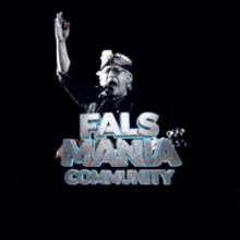 a man is singing into a microphone in front of a sign that says ' false mania community '