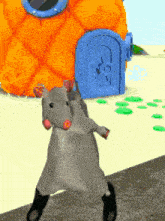 a cartoon mouse is dancing in front of a sponge bob house