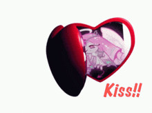 a couple of heart shaped objects with the word kiss on the bottom right