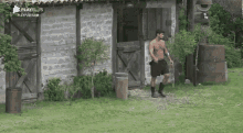 a man without a shirt is walking in front of a playplus logo