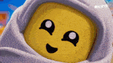 a close up of a cartoon character 's face with the word ok on the bottom left