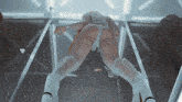 a woman 's butt is shown in a very revealing outfit