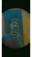 a young man is taking a picture of himself with his phone