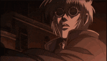 a cartoon character wearing sunglasses holds a gun