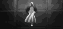 a black and white drawing of a woman with long hair