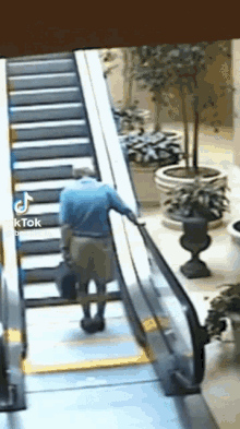 Old Man Falling Down Escalator Escalator GIF - Old Man Falling Down Escalator Escalator Funny GIFs