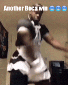 a man in a maid costume is dancing in a room with the caption another boca win