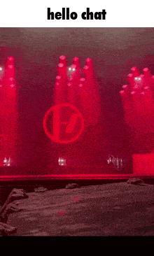 a picture of a stage with red lights and the words hello chat on the bottom