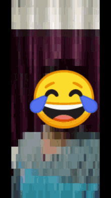a pixelated image of a smiley face with tears coming out of it 's eyes