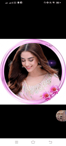 a woman in a pink dress is in a pink circle