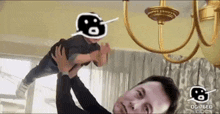 a man is holding a child in his arms with a speech bubble that says og 76ed