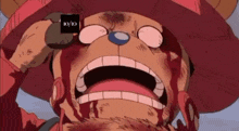 a close up of a cartoon character with blood coming out of his mouth .