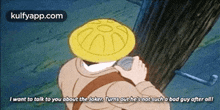 a cartoon of a man wearing a yellow hat talking to someone about the joker