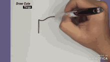 a person is drawing a line with a marker that says deli