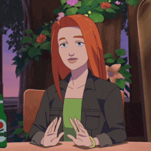 a woman with red hair is sitting at a table