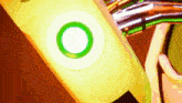 a close up of a person 's arm with a green circle on it .