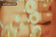 a close up of a person 's mouth with a watermark that says kulfyapp.com .