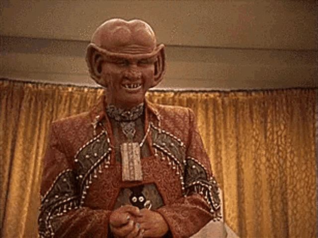 brunt fca sitting down on grand nagus throne tentatively