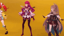 three anime girls are dancing together on a yellow background in a video game .