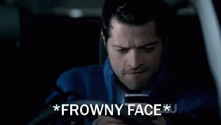 Castiel Supernatural GIF - Texting Frowny Face