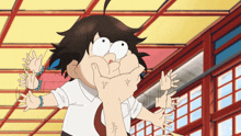 a cartoon of a man being punched by another man 's hand