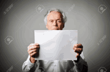 Old Man Holding Paper Passport GIF - Old Man Holding Paper Passport Paper GIFs